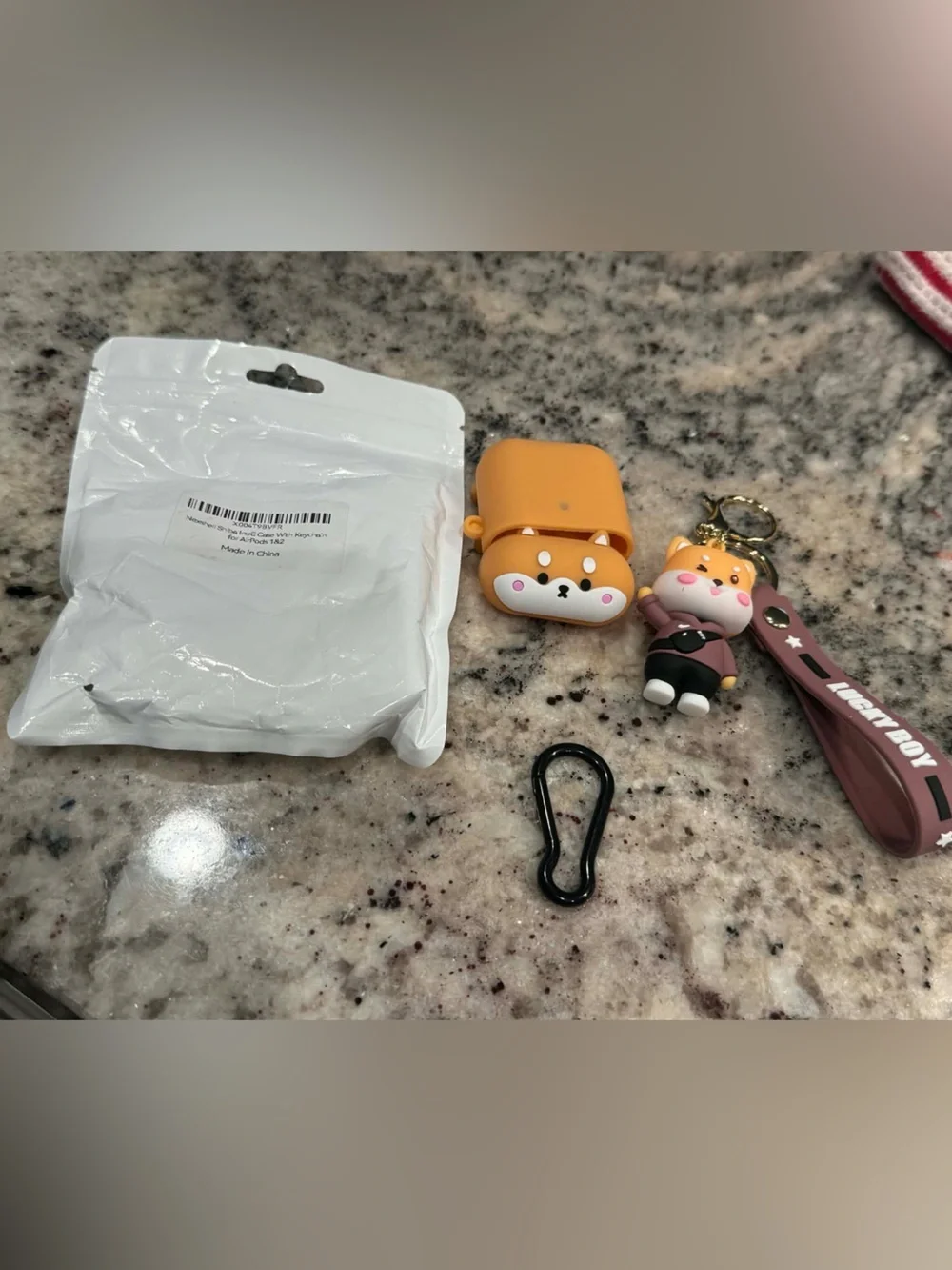 Lucky Brand Orange Lucky Boy Silicone AirPods 1&2 Case with Keychain Strap
